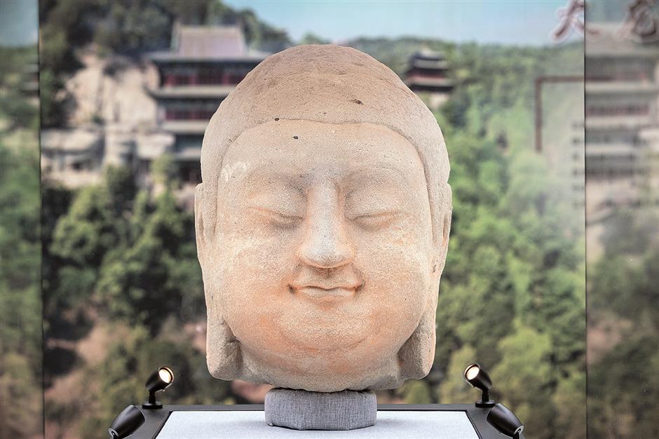 Stolen Buddha statue comes home to China