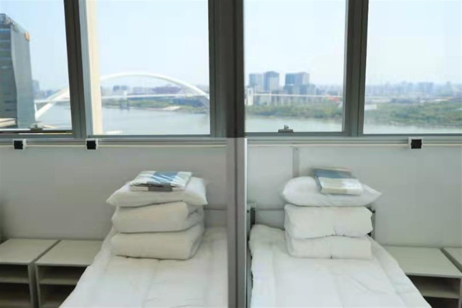 Shanghai office towers become makeshift hospitals in city-first initiative