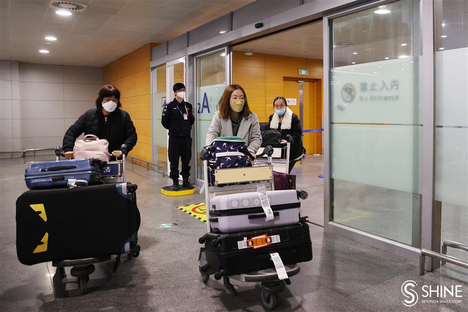 Shanghai greets first international arrivals, with no COVID limitations