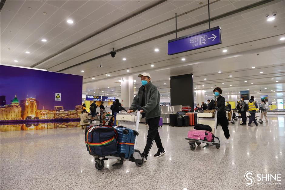 Shanghai greets first international arrivals, with no COVID limitations