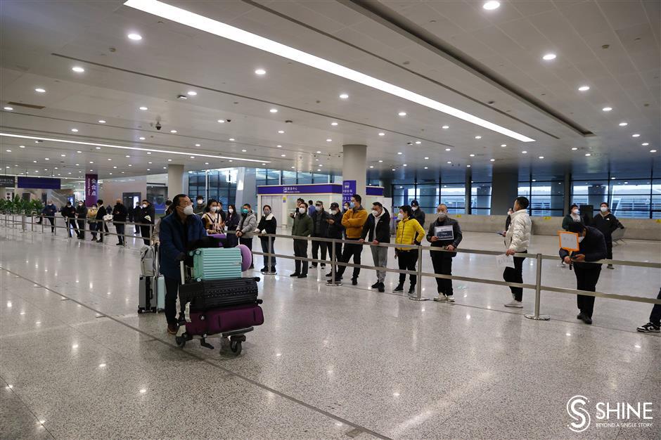 Shanghai greets first international arrivals, with no COVID limitations